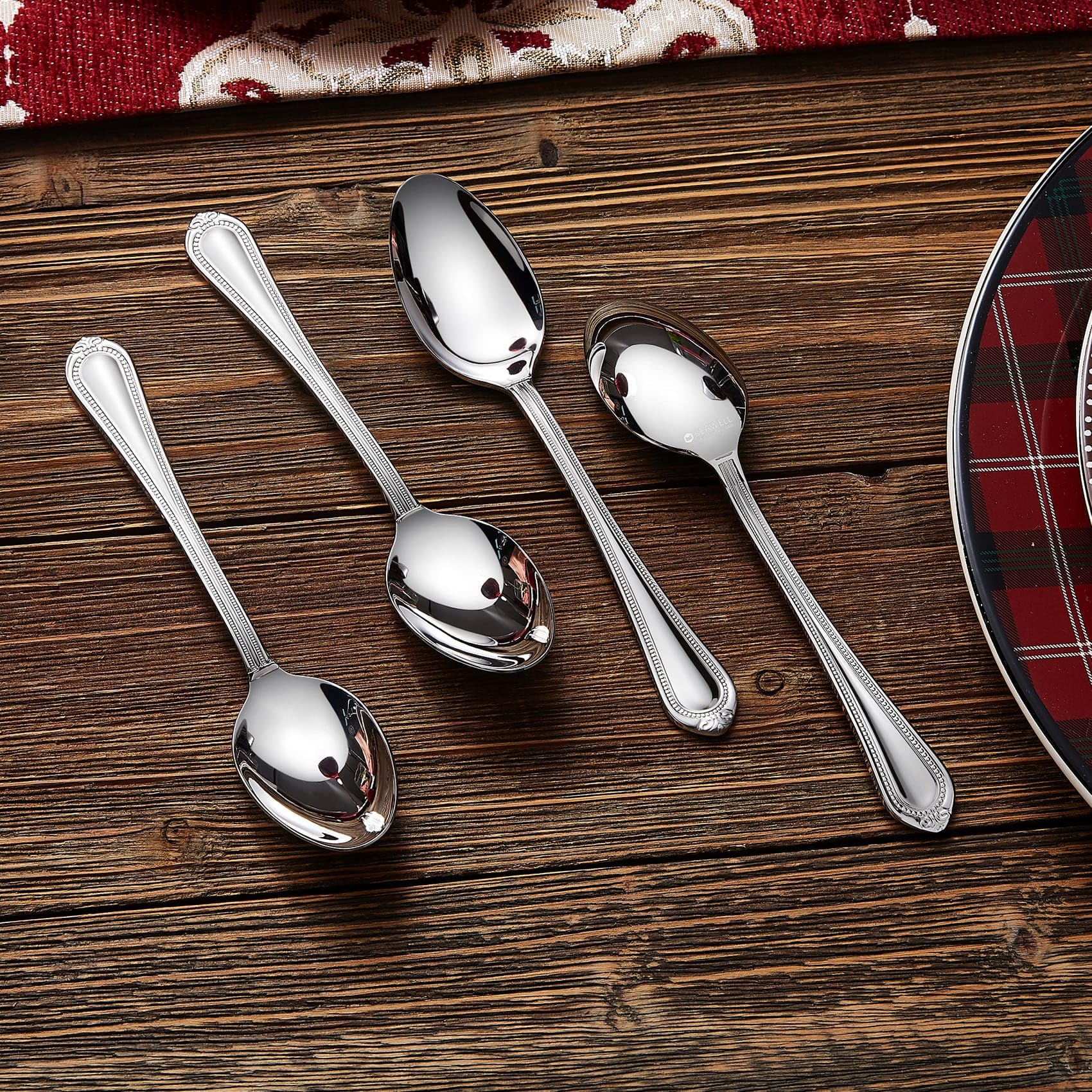 KEAWELL Pearl Edge serving spoons in a dining setup for hosting.