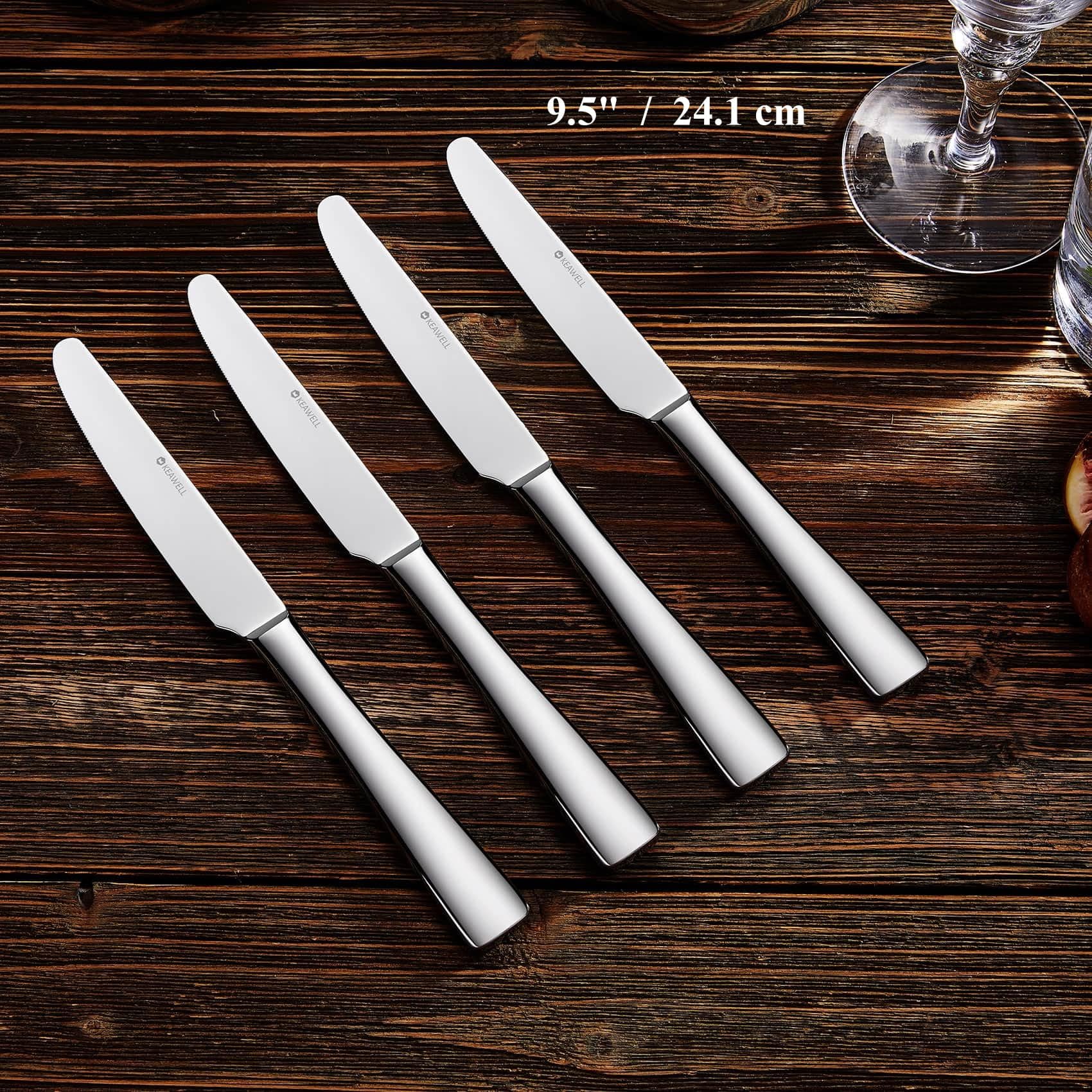 KEAWELL dinner knife blade close-up highlighting sharp serration and satin finish.