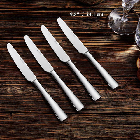 KEAWELL dinner knife blade close-up highlighting sharp serration and satin finish.