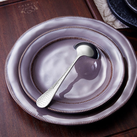 KEAWELL premium ladle shown in elegant table setting and packaging.