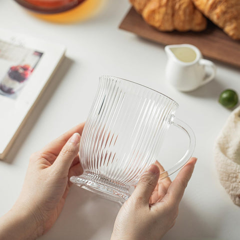 KEMORELA 16oz clear mug with a comfortable handle for generous pours.