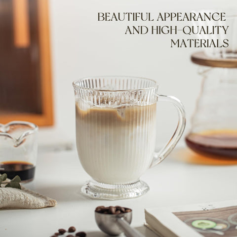 KEMORELA clear glass mug with wide base for steady placement.