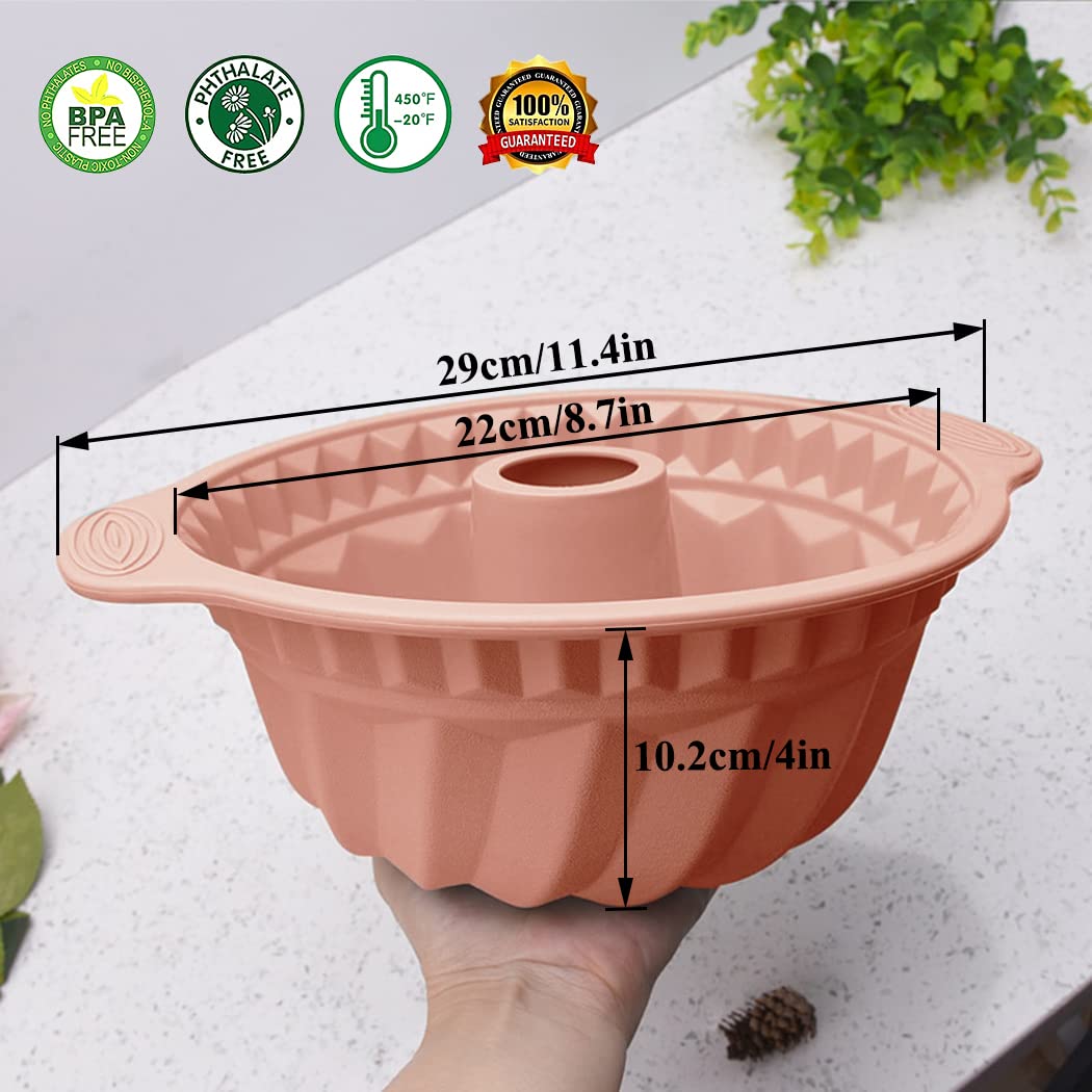 Kenond pink 9.5 inch silicone cake pan with a sturdy handle for secure grip.