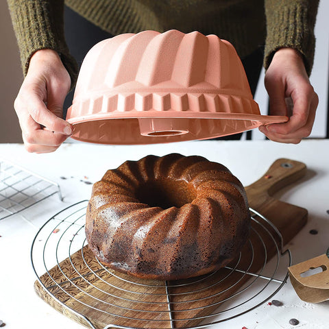 Kenond pink silicone cake pan non-stick surface aids simple cleanup.
