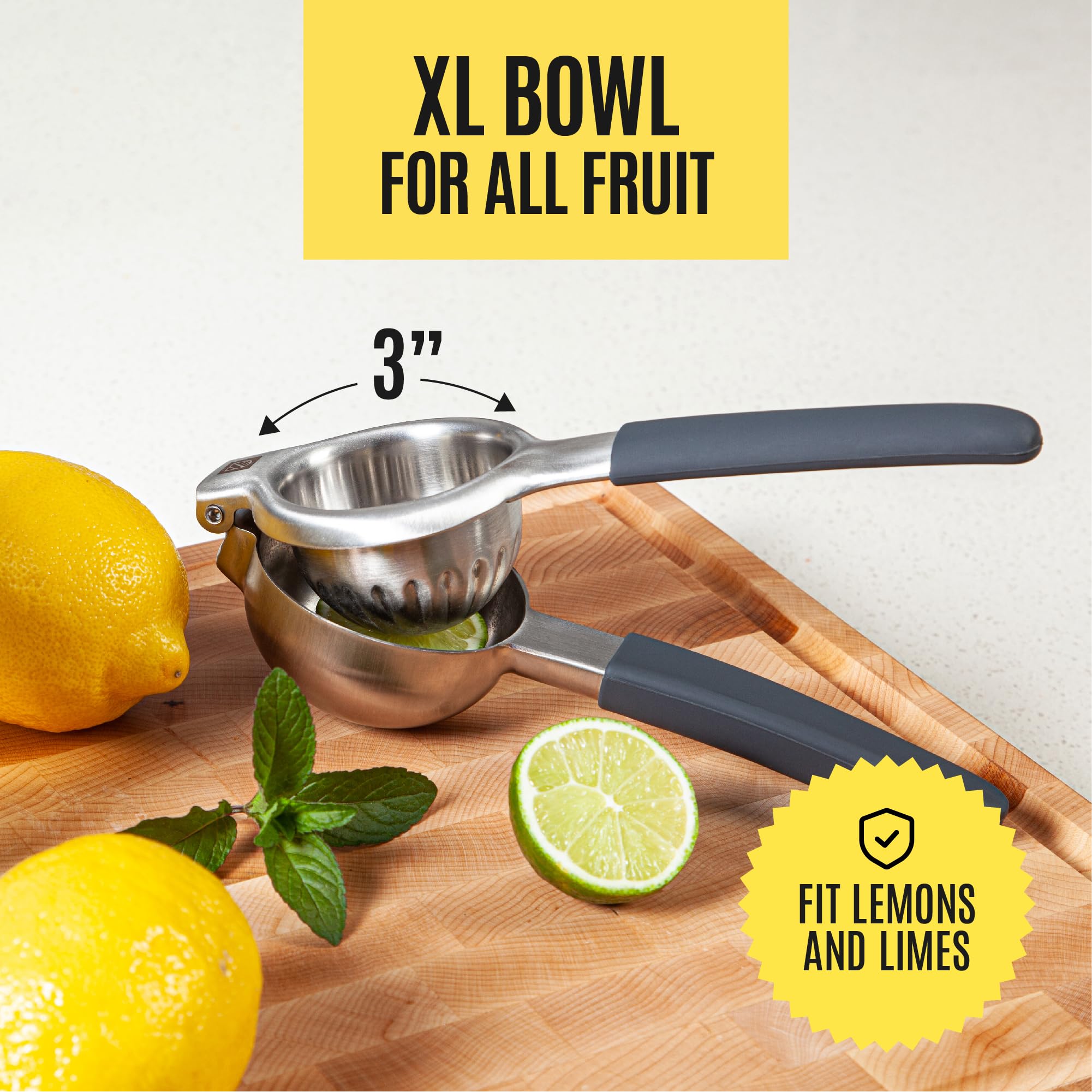 Kensington London squeezer in action shows efficient citrus pressing.