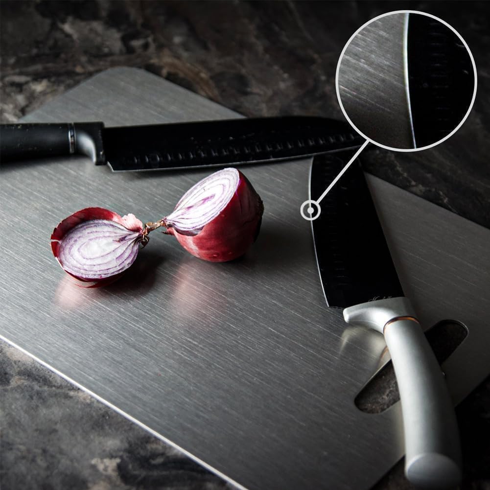 Kesefunm titanium cutting board in use for herbs and proteins