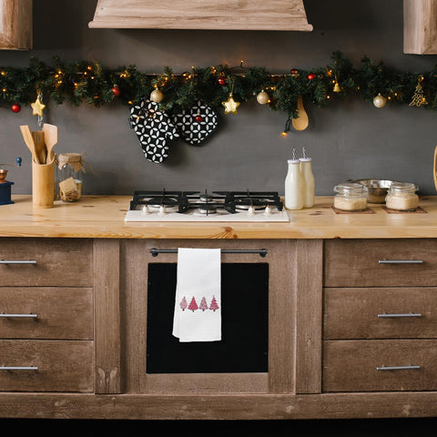 KEUSPI Pink Christmas kitchen towel on dish rack highlights fast-dry performance.
