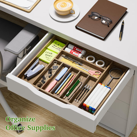Kiasthome Acacia organizer with grooved dividers guides utensils for quick access.