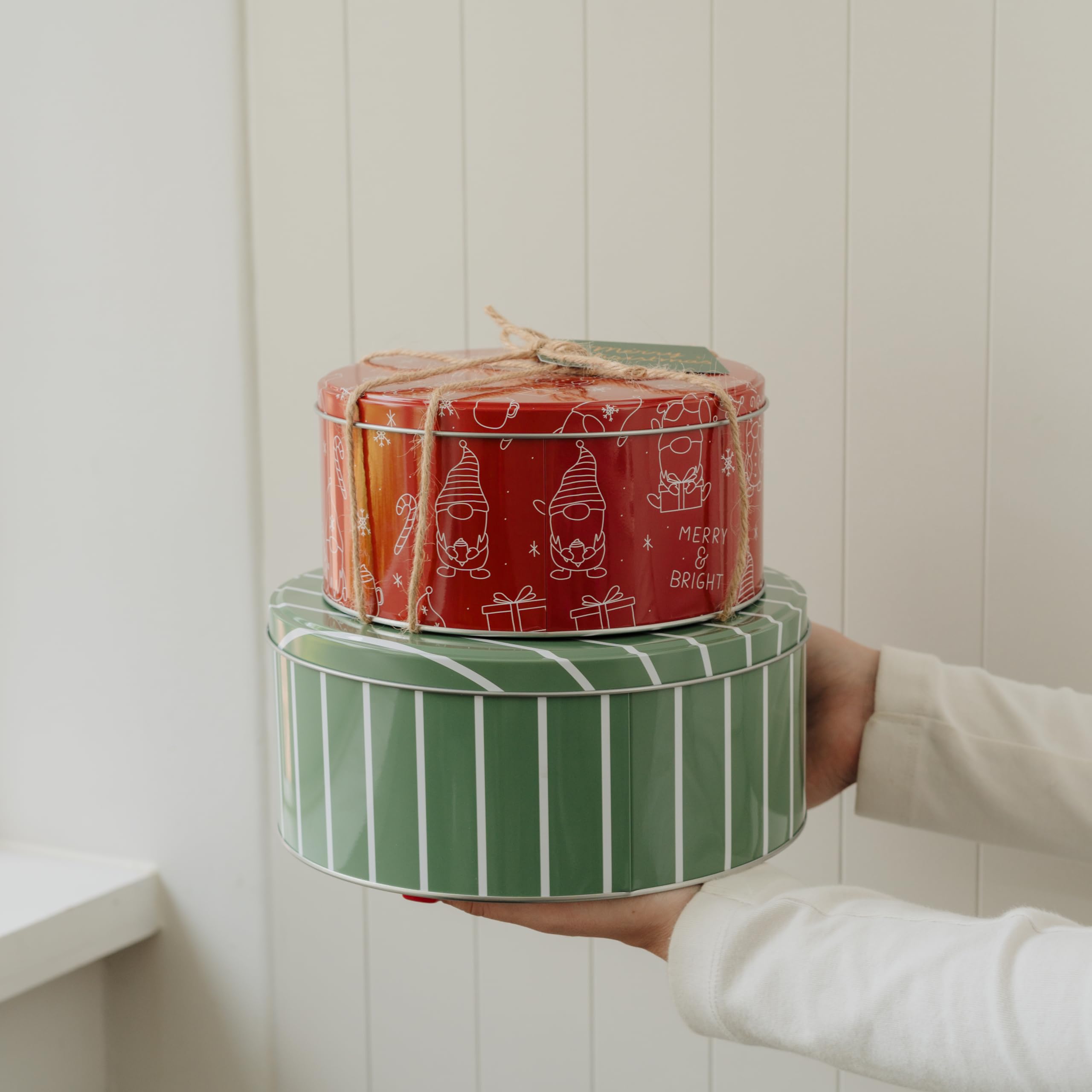 KIBAGA lid-on tin shows secure freshness for sharing baked goodies.