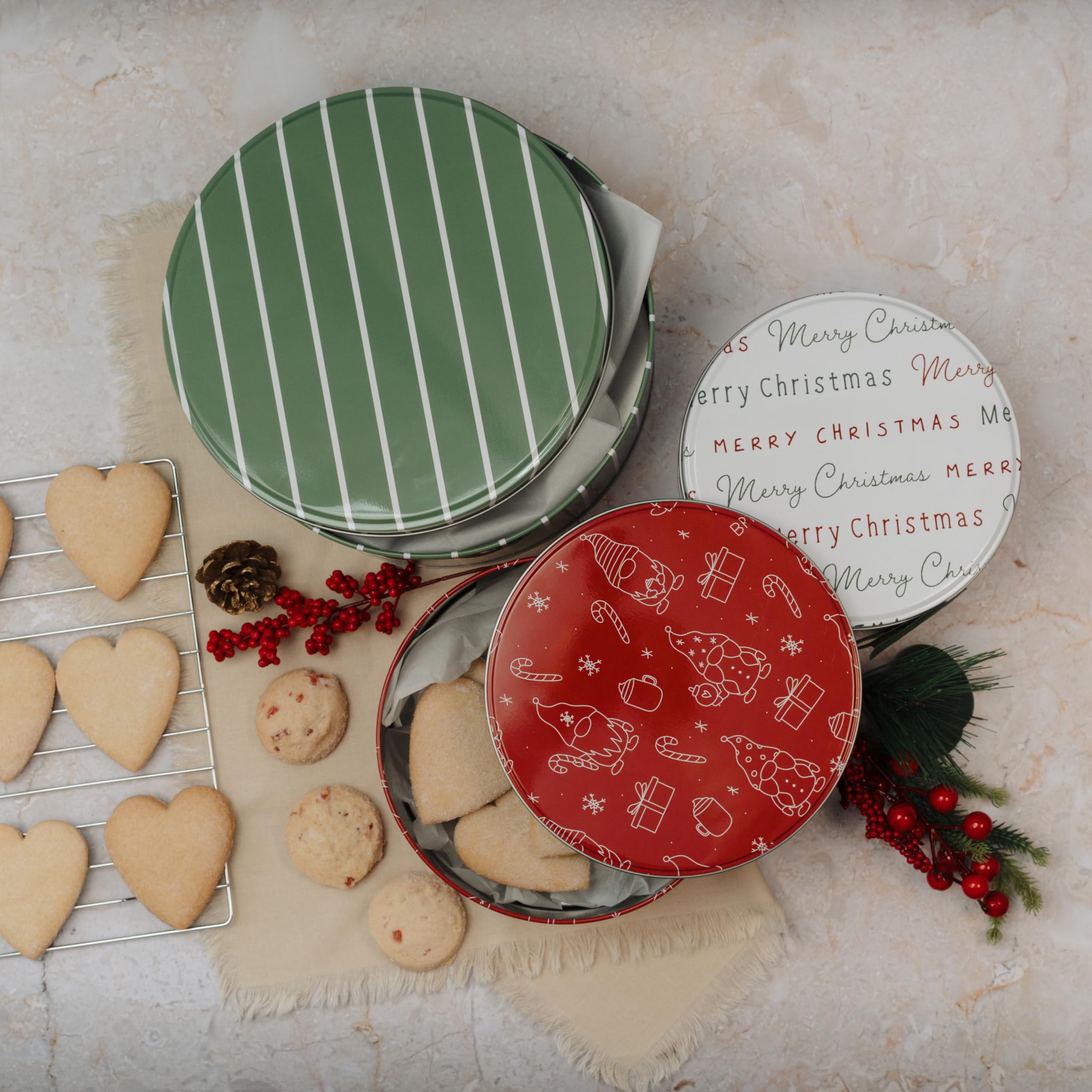 KIBAGA small white Merry Christmas tin keeps treats crisp and ready to share.