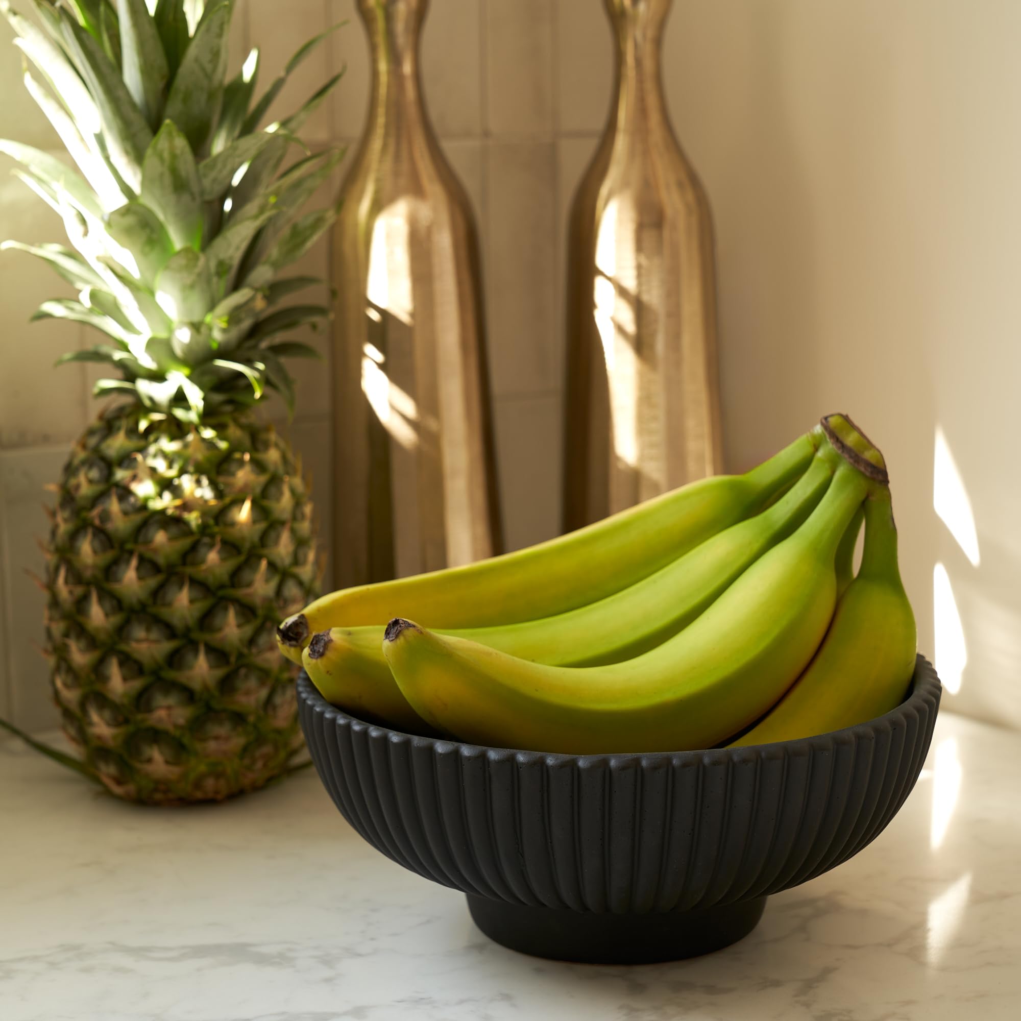KIBAGA concrete fruit bowl on kitchen counter adds instant style