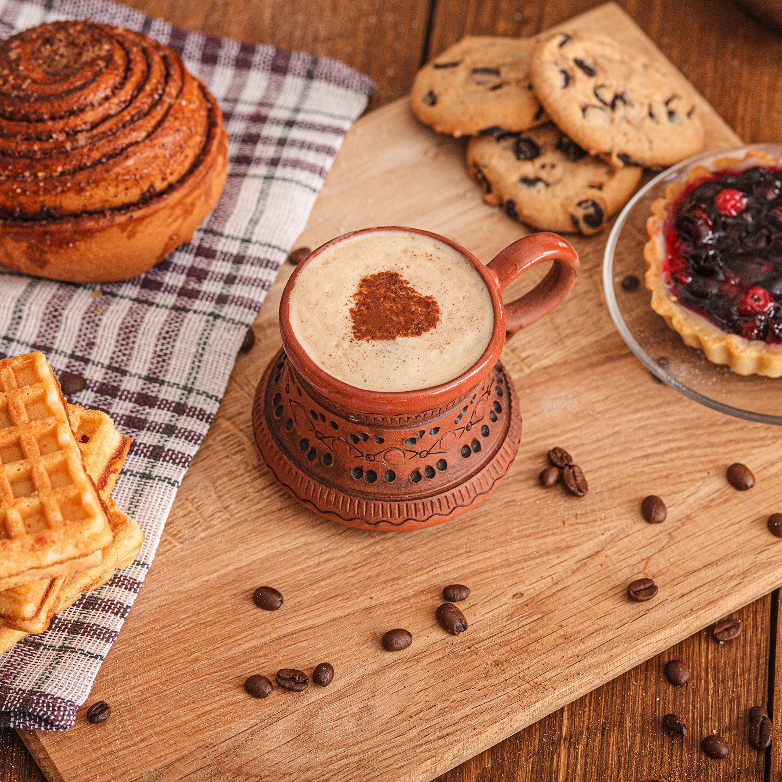 KIBS Handmade potbelly mug with blue hue reimagines coffee ritual.