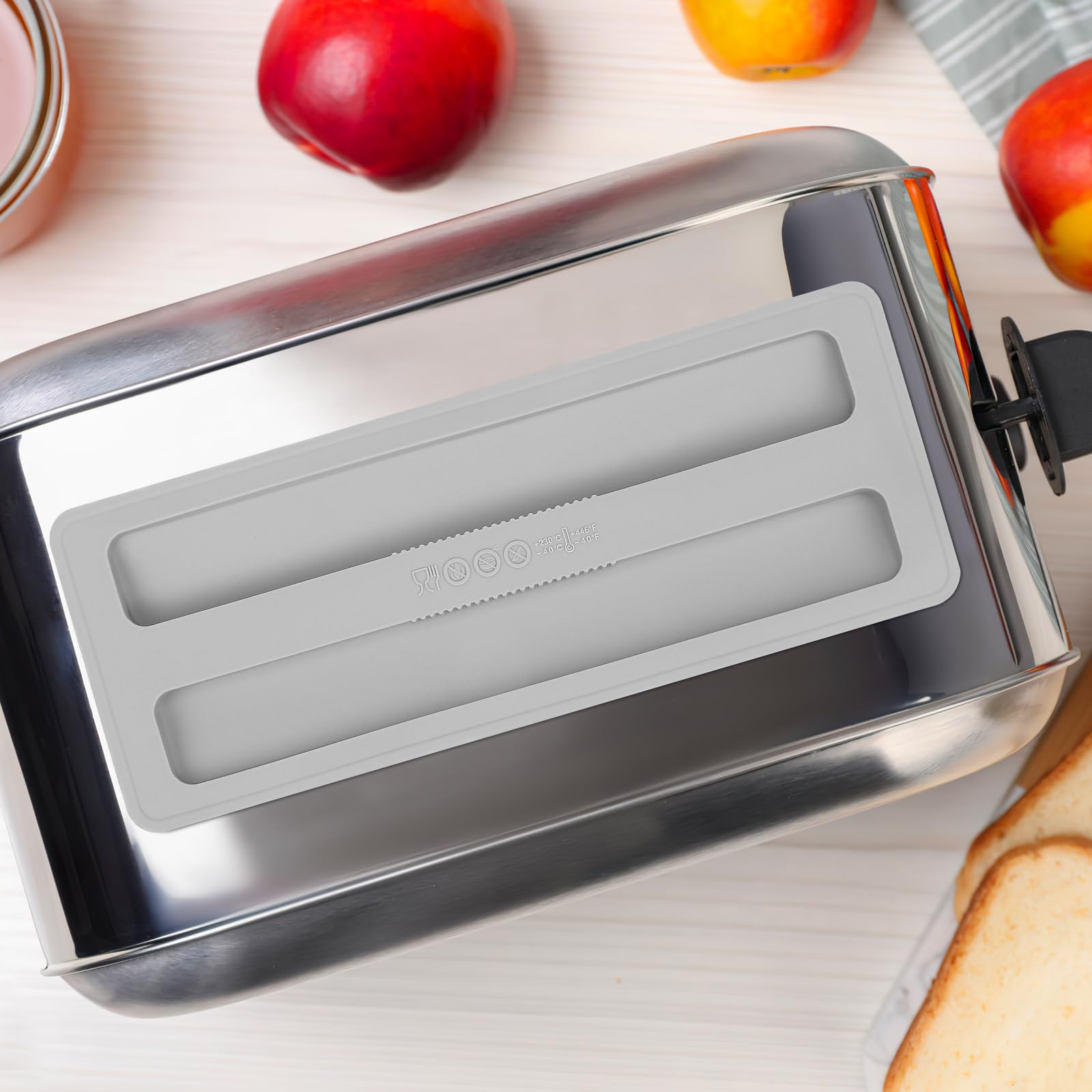 Kichvoe 2-slice toaster cover protects against fingerprints and spills on the counter.