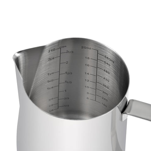 Kichwit measuring cup with pour spout designed for clean, drip-free pouring.