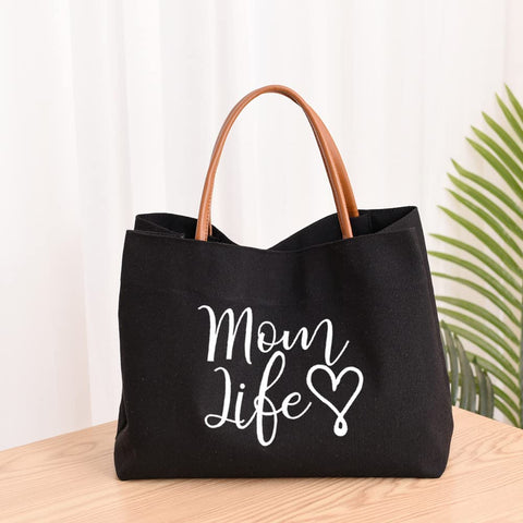 Kifasyo Mom Mama Bag open main compartment demonstrates easy access and organization.