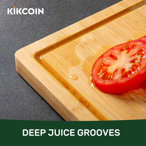 Kikcoin bamboo cutting board with reversible surfaces for raw and cooked prep.