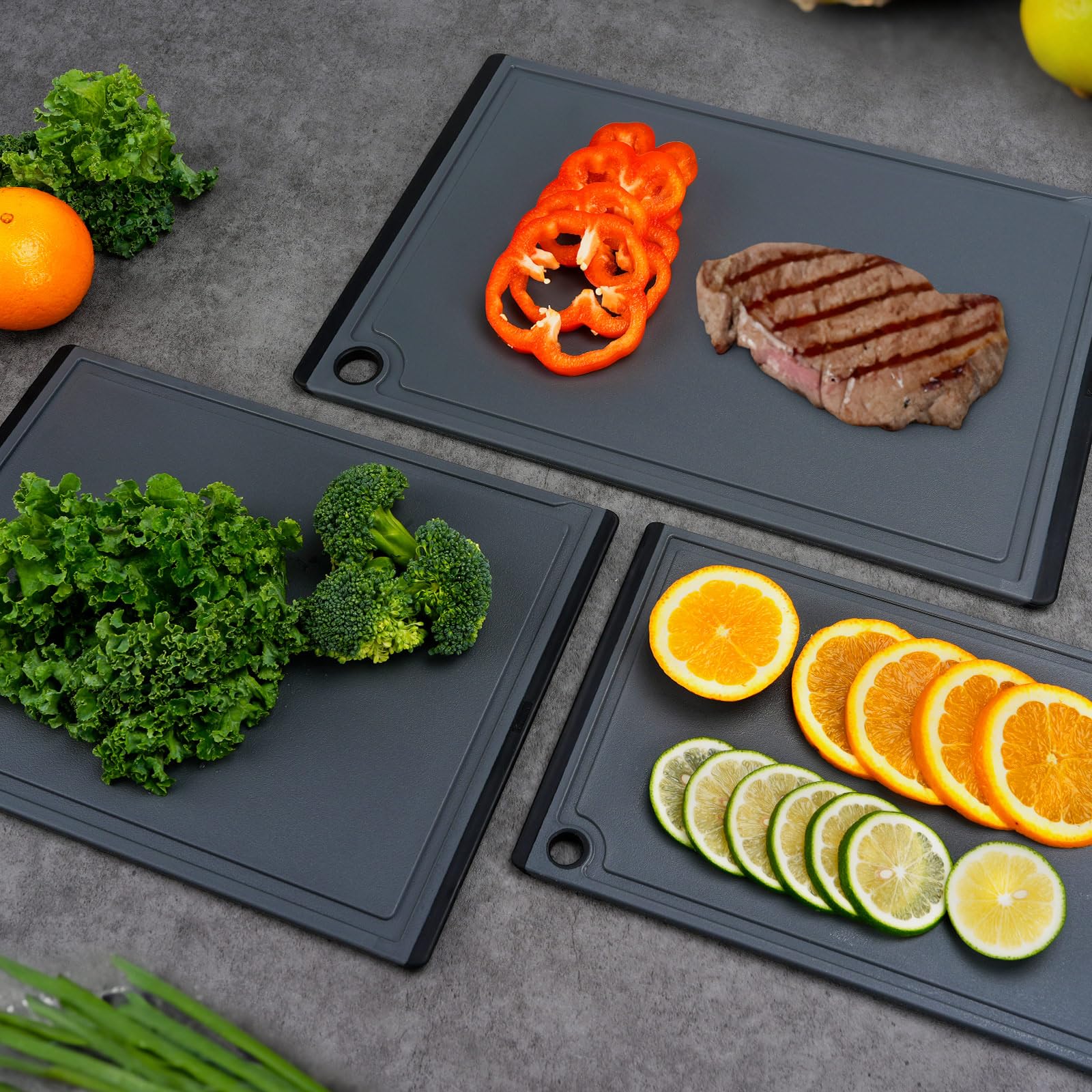 Kikcoin cutting board with rubber feet stabilizing on the counter.