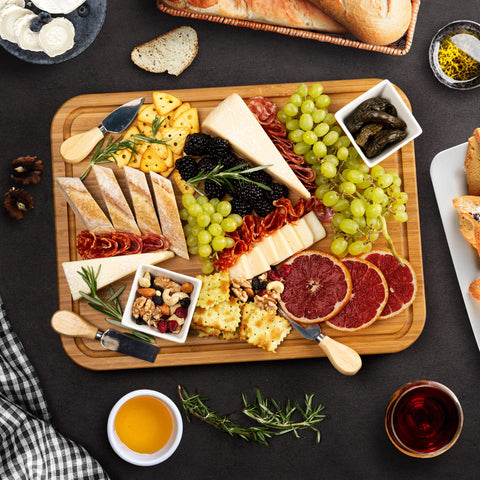 Kikcoin serving tray doubles as carving board for elegant presentations.