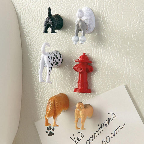 Kikkerland dog butt magnets on memo board for notes