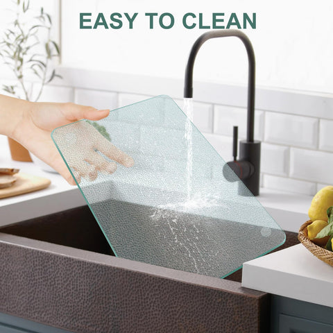 KimiDitt glass cutting board dishwasher-safe for quick cleanup after meals.