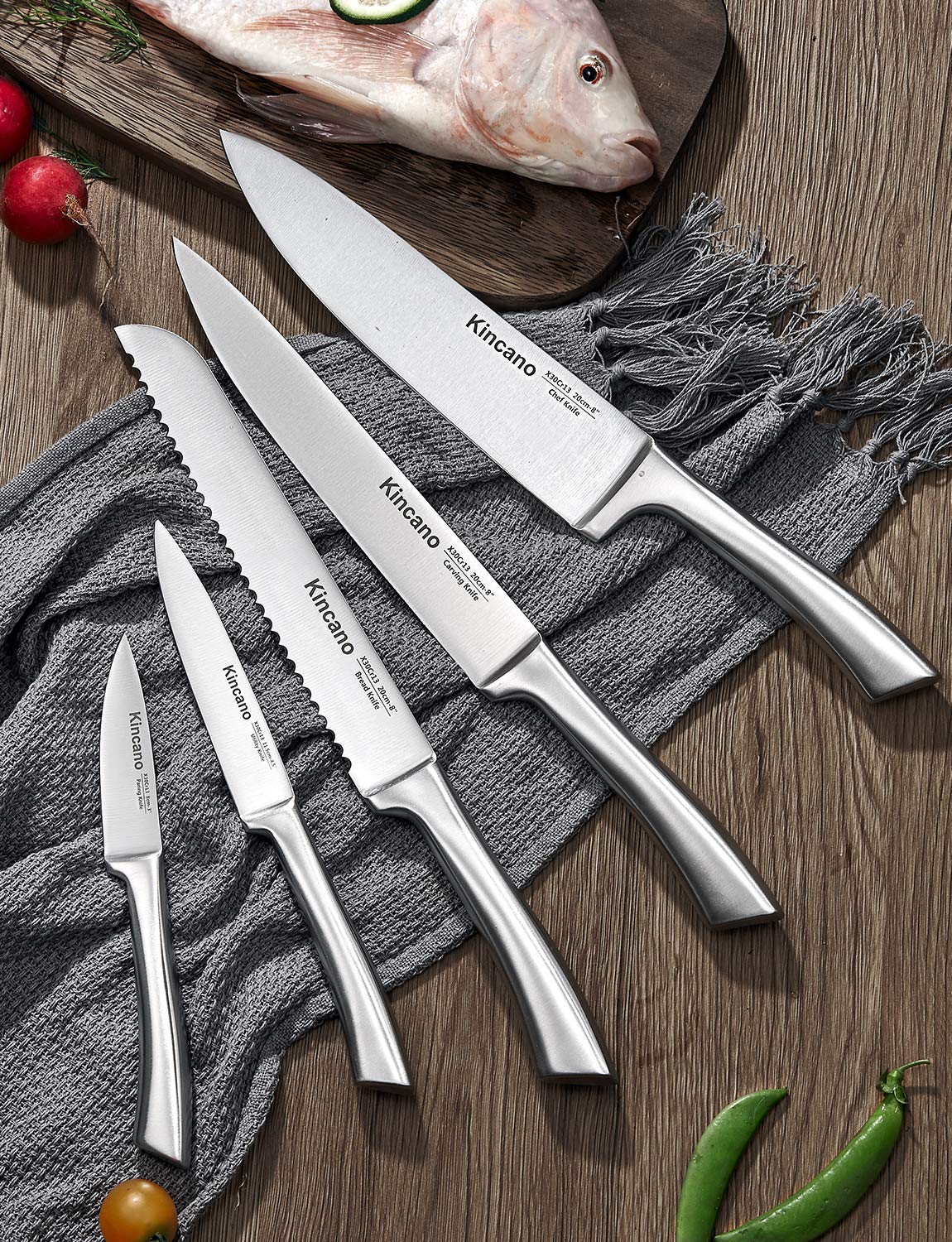 Kincano 6-piece steak knives with ergonomic handles for comfortable dining prep.