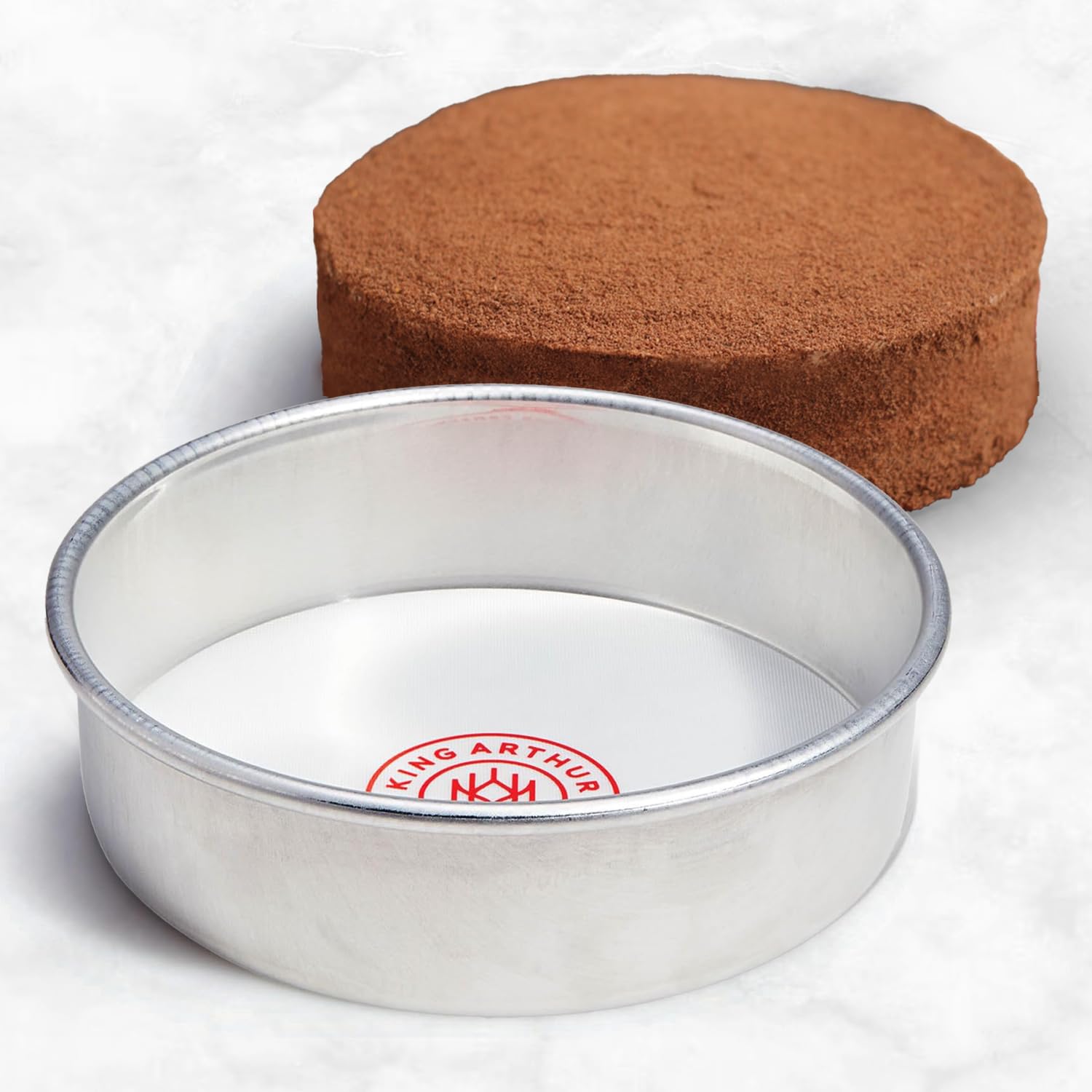 King Arthur liner with reinforced edges stays flat for clean, even baking