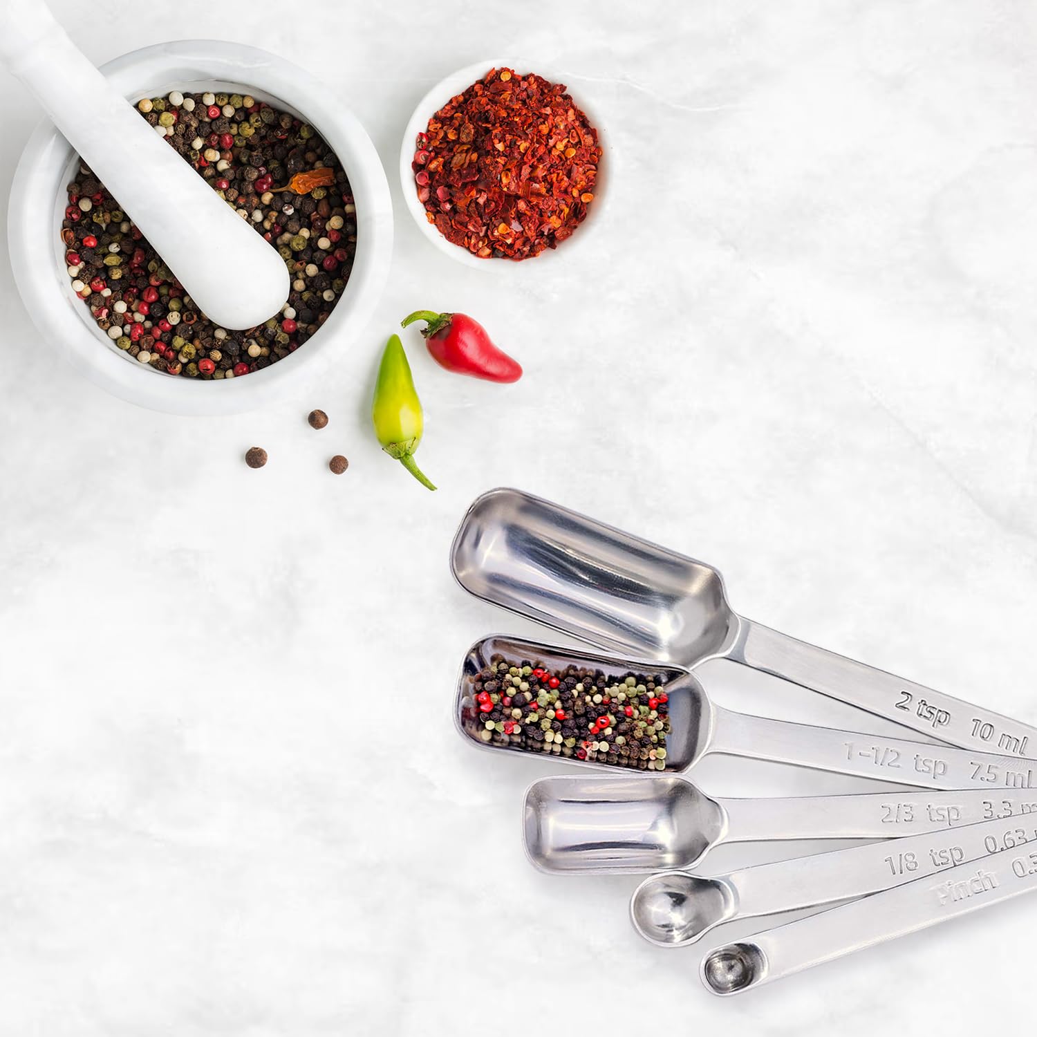 King Arthur 2/3 teaspoon spoon balances spices for sauces and flavor blends.