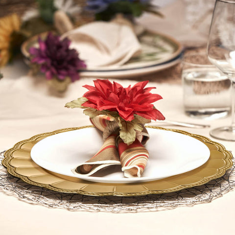 Kingrol decorative charger plates double as centerpieces when not in use.