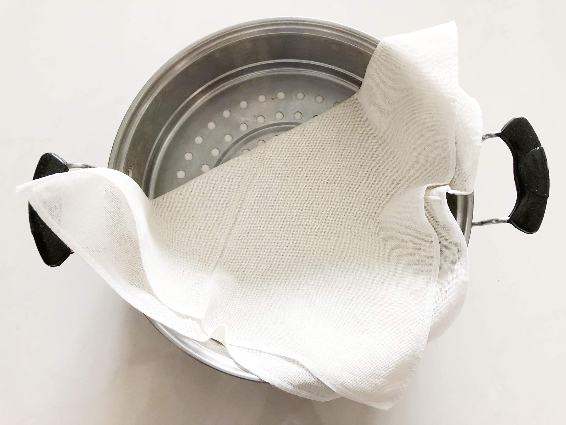 King's Deal bamboo cotton mesh pad for steaming vegetables and grains.