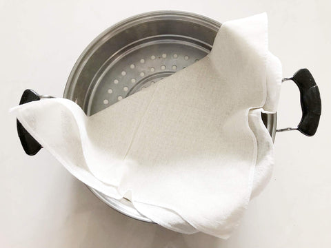King's Deal bamboo cotton mesh pad for steaming vegetables and grains.