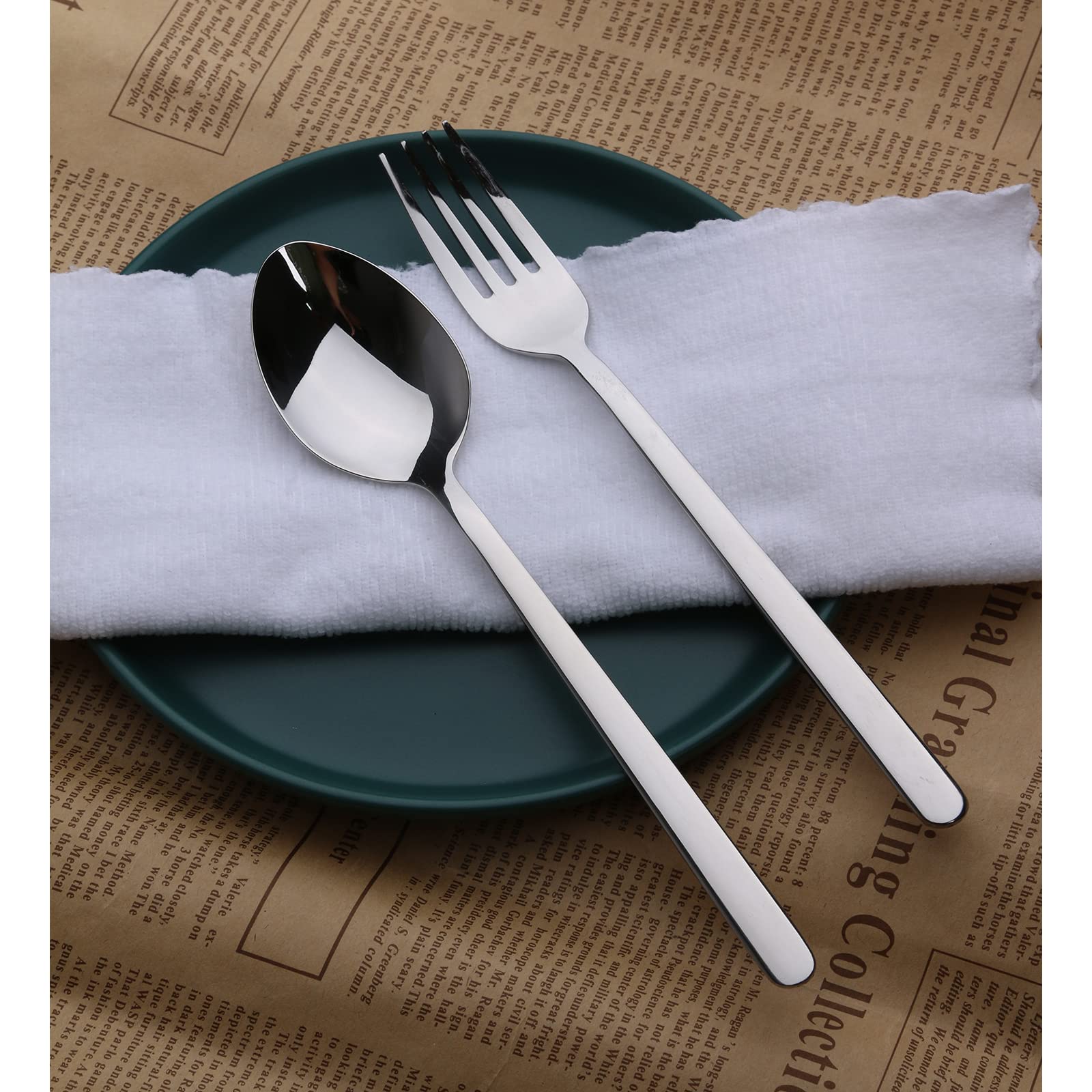 Kingstone mirror-polished finish enhances an elegant table setting.