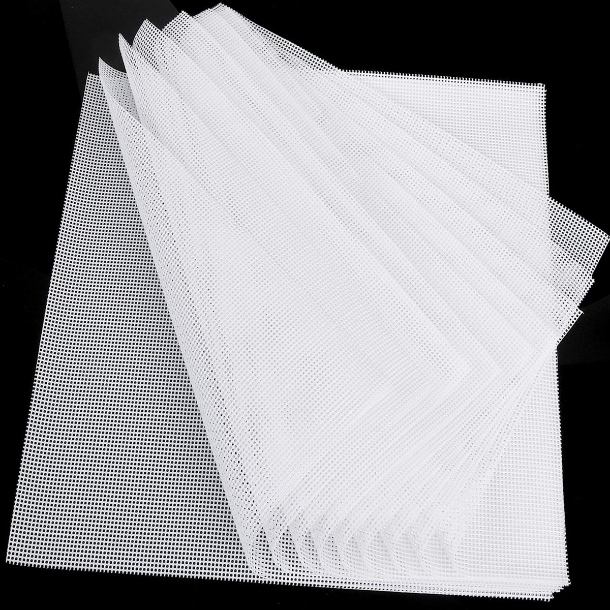 Kispog silicone dehydrator sheets 14x14 pack shown in a tray for nonstick drying