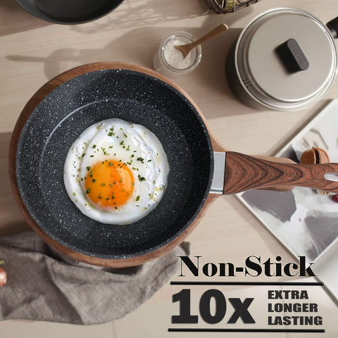 Kitchen Academy 8-inch and 11-inch fry pans with smooth nonstick surface.