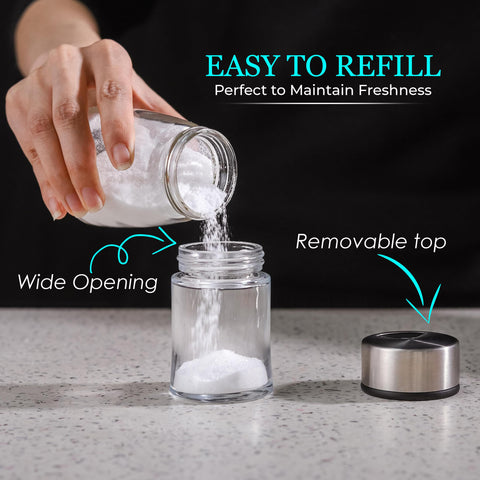 Kitchen-GO shakers showing adjustable pour holes for controlled seasoning flow