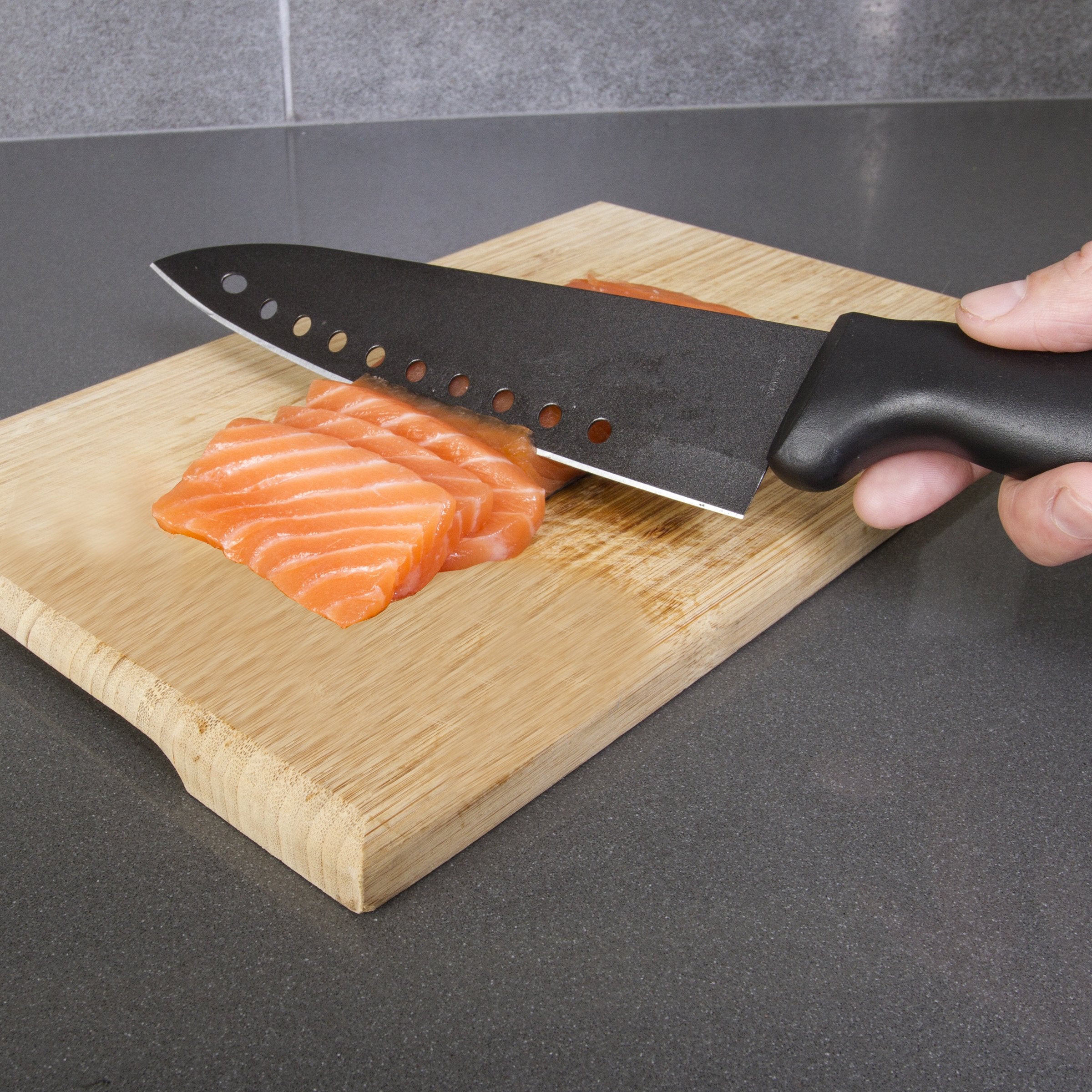 Kitchen Home nonstick sushi knife slicing sushi rolls without tearing.
