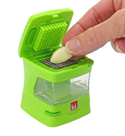 Garlic-A-Peel with slicing blade for long garlic strands