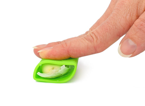 Compact storage compartment holds an extra blade