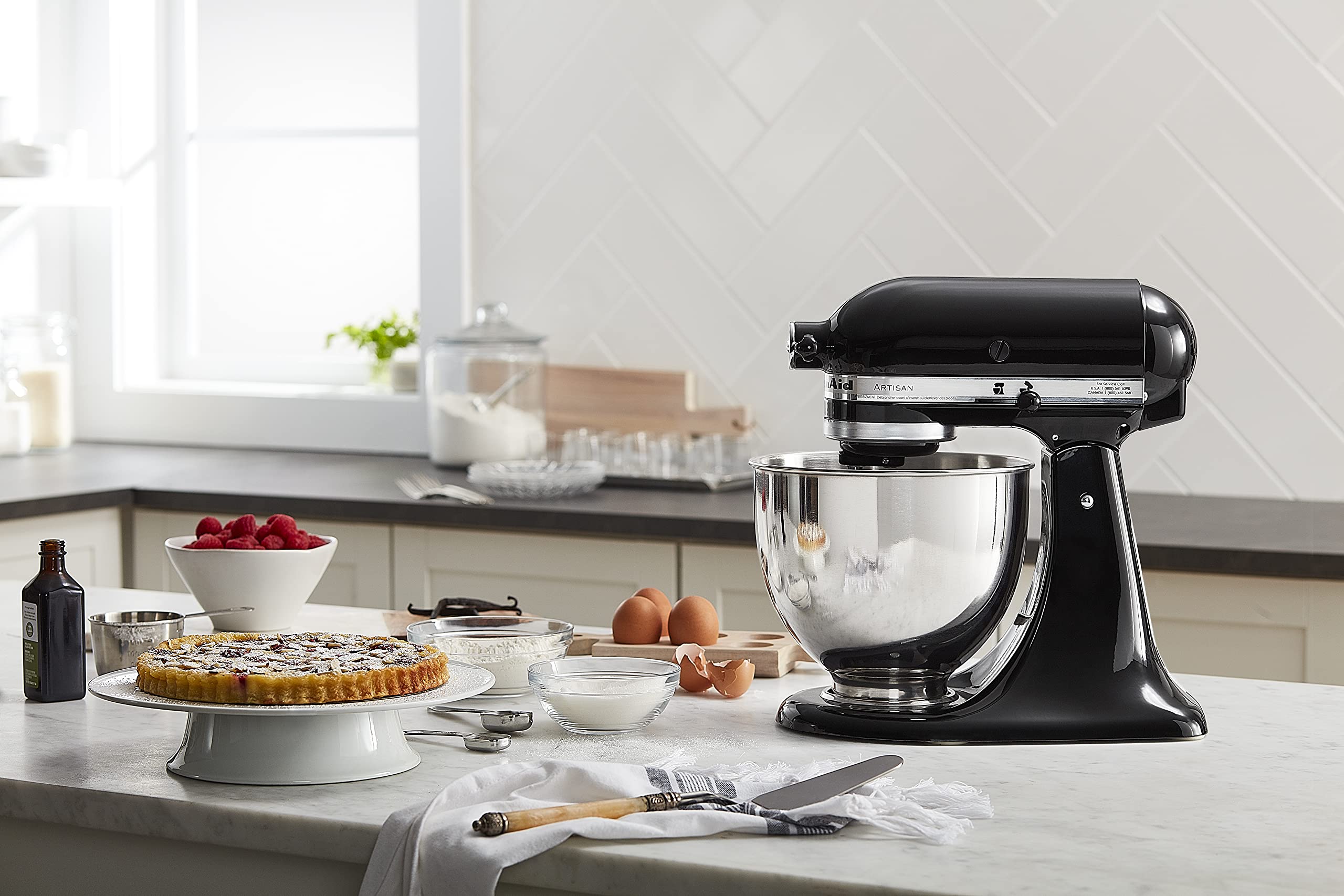 Tilt-head design provides easy access to ingredients and quick attachment changes.
