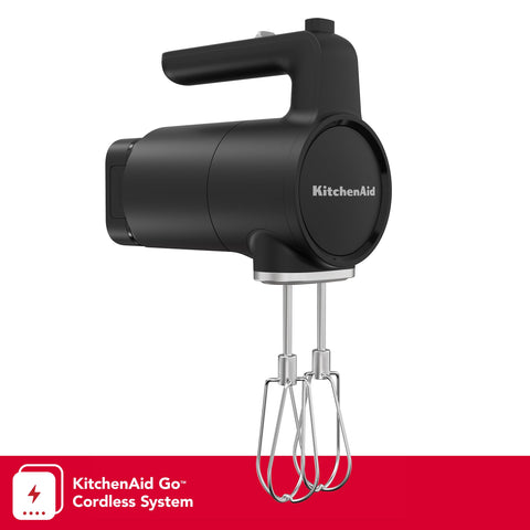 KitchenAid Go cordless hand mixer charging with USB-C cable for quick recharges