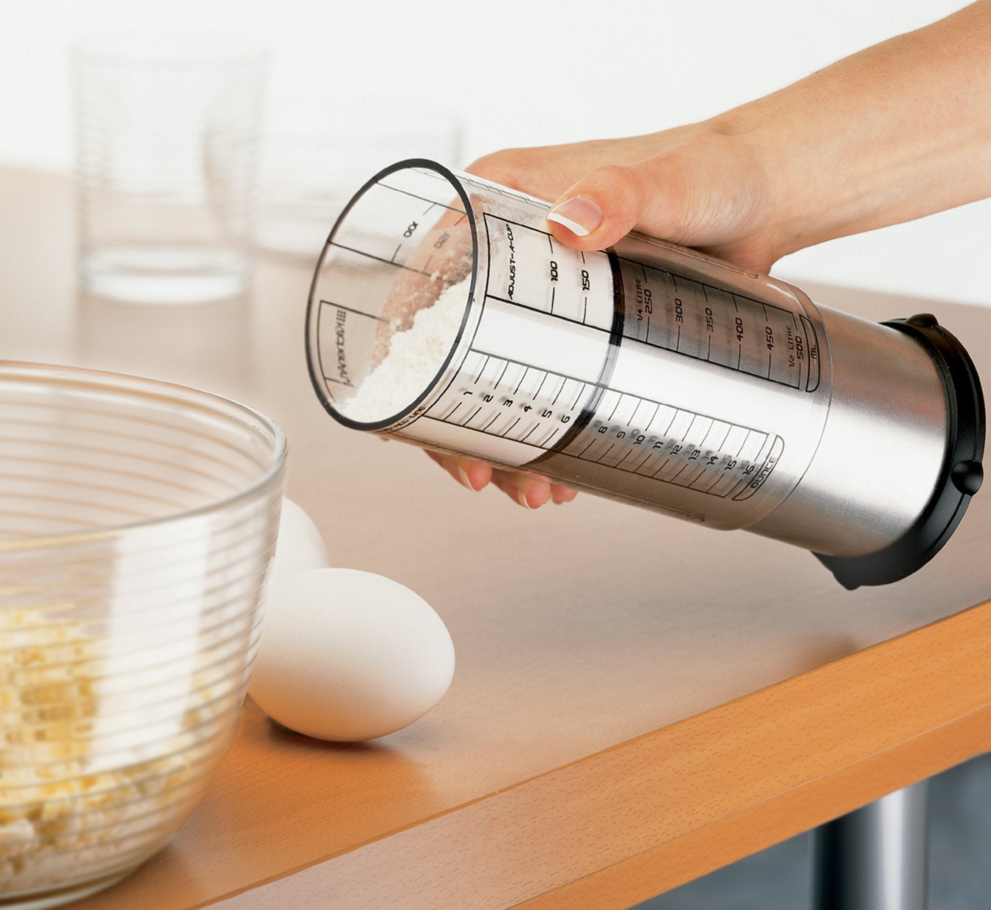 KitchenArt Pro 2 Cup Adjust-A-Cup metric and imperial marks clearly.