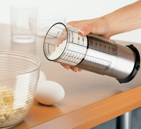 KitchenArt Pro 2 Cup Adjust-A-Cup metric and imperial marks clearly.