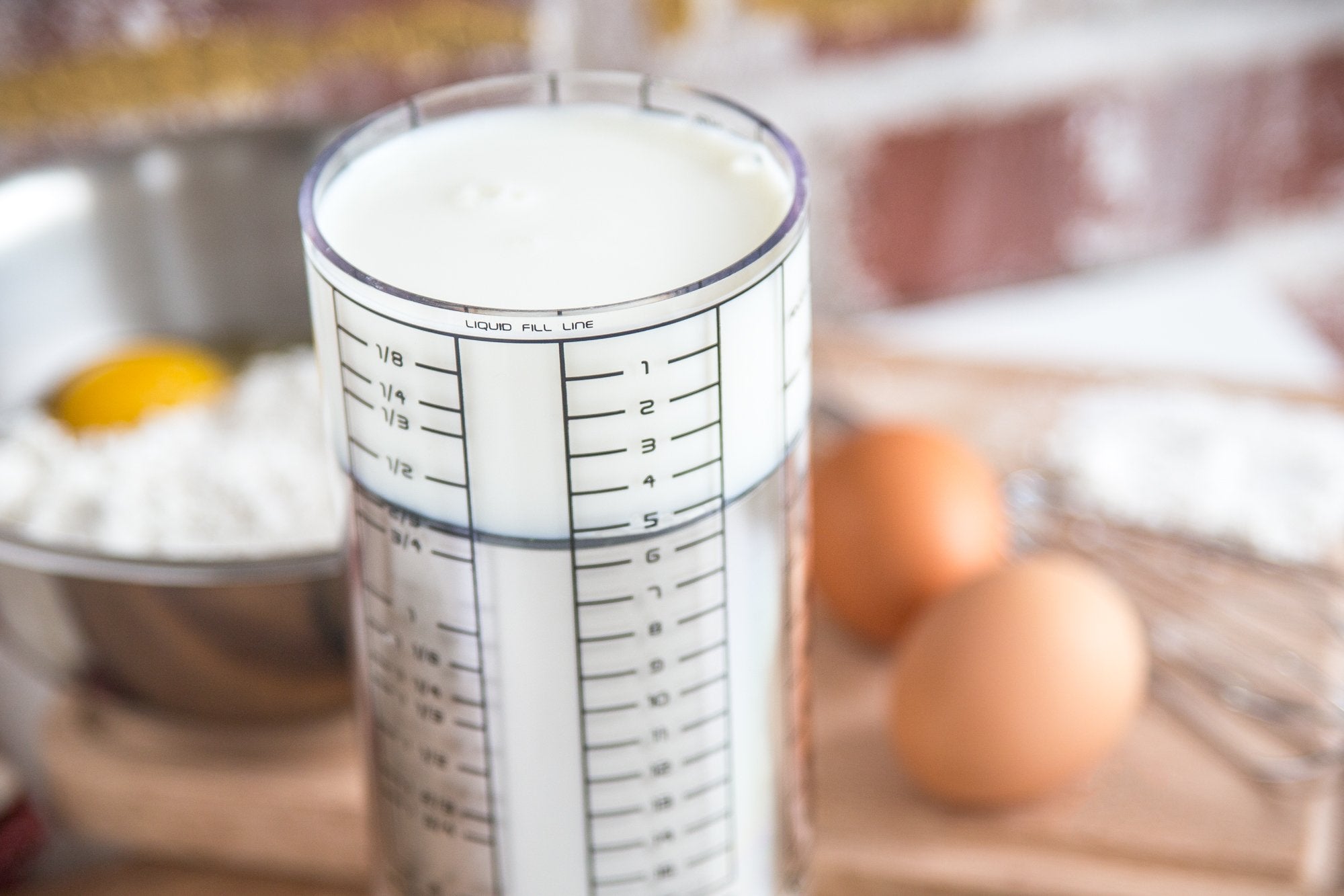 KitchenArt Pro 2 Cup Adjust-A-Cup space-saving design reduces clutter.