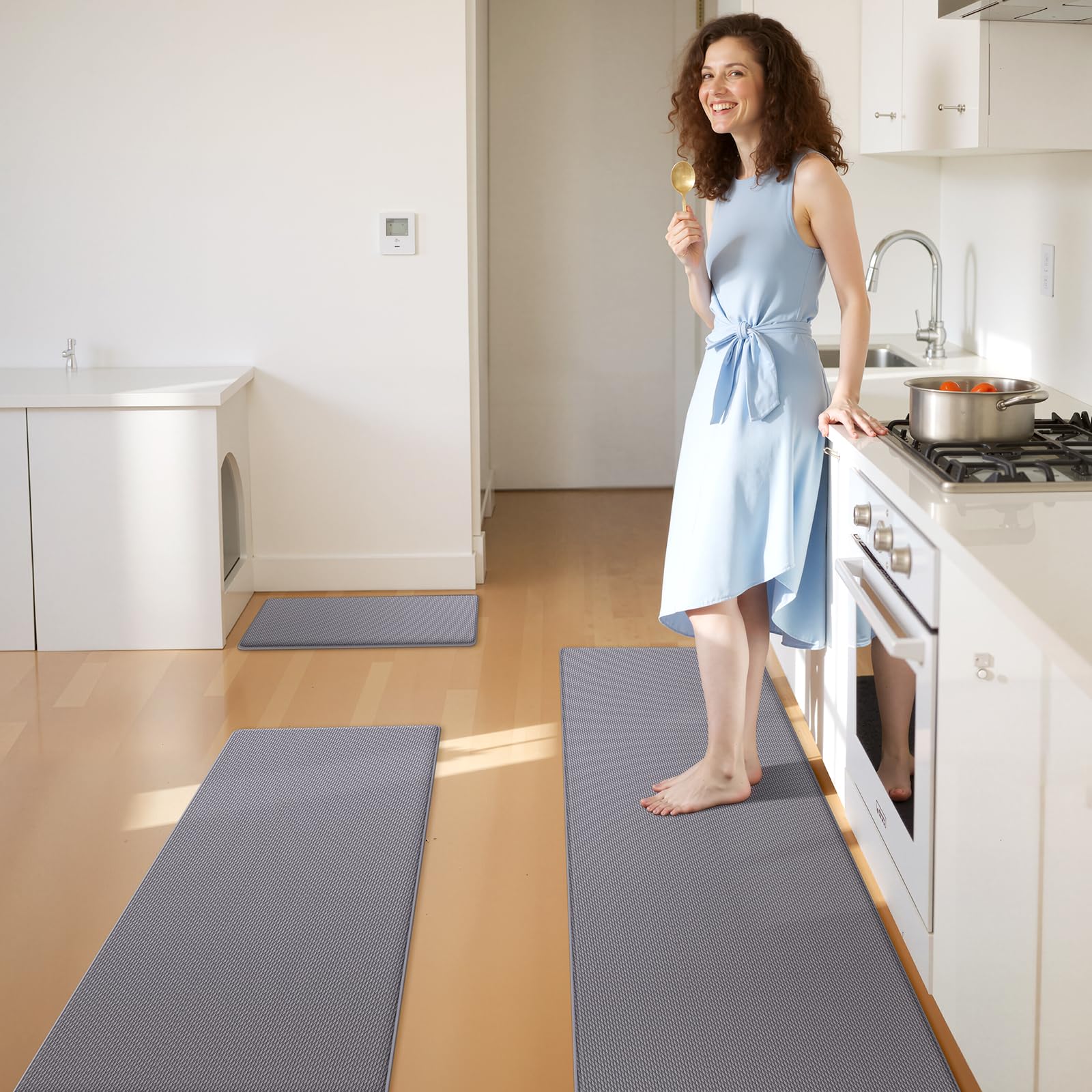 KitchenClouds Anti-Fatigue Mat cushions feet during long cooking sessions.