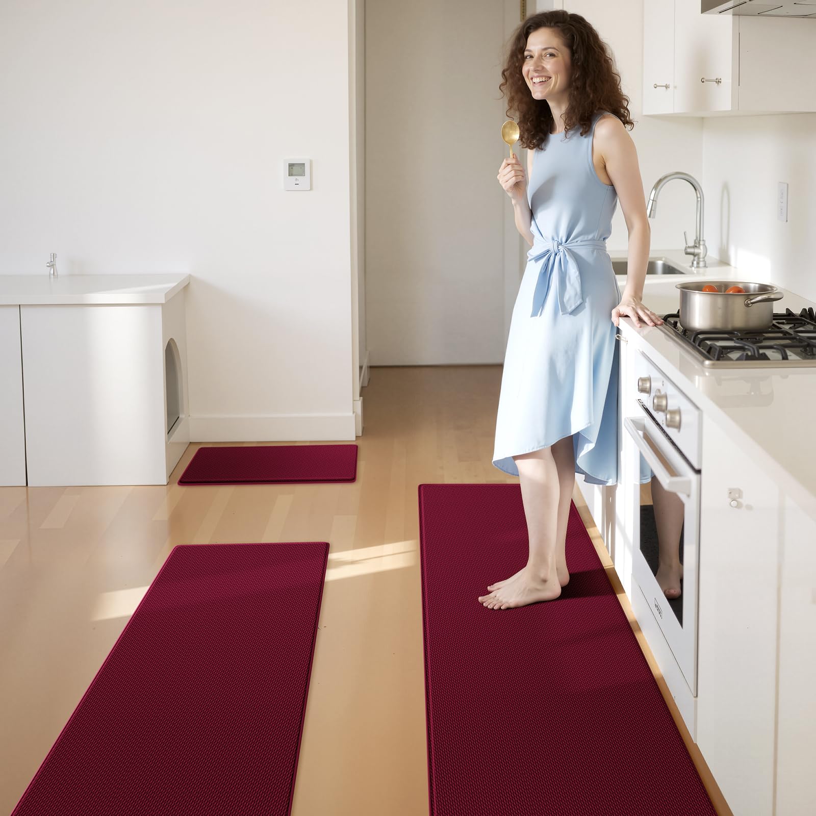 KitchenClouds waterproof mats for kitchen and sink areas in busy homes.