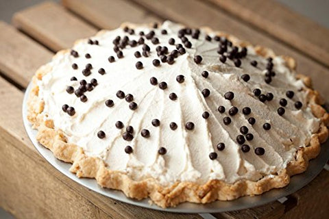 KitchenDance 9-inch round foil pan in oven-use angle shows sturdy support for desserts.