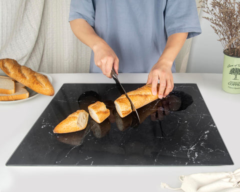 Kitchenville cutting board with four non-slip feet for stable prep.