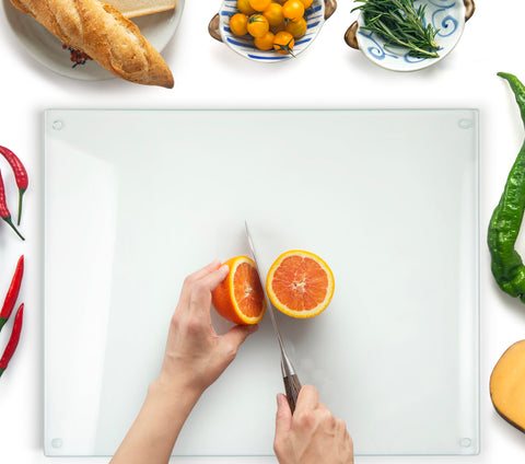 Kitchenville glass cutting board top view showing 20x16 size and prep-ready surface.