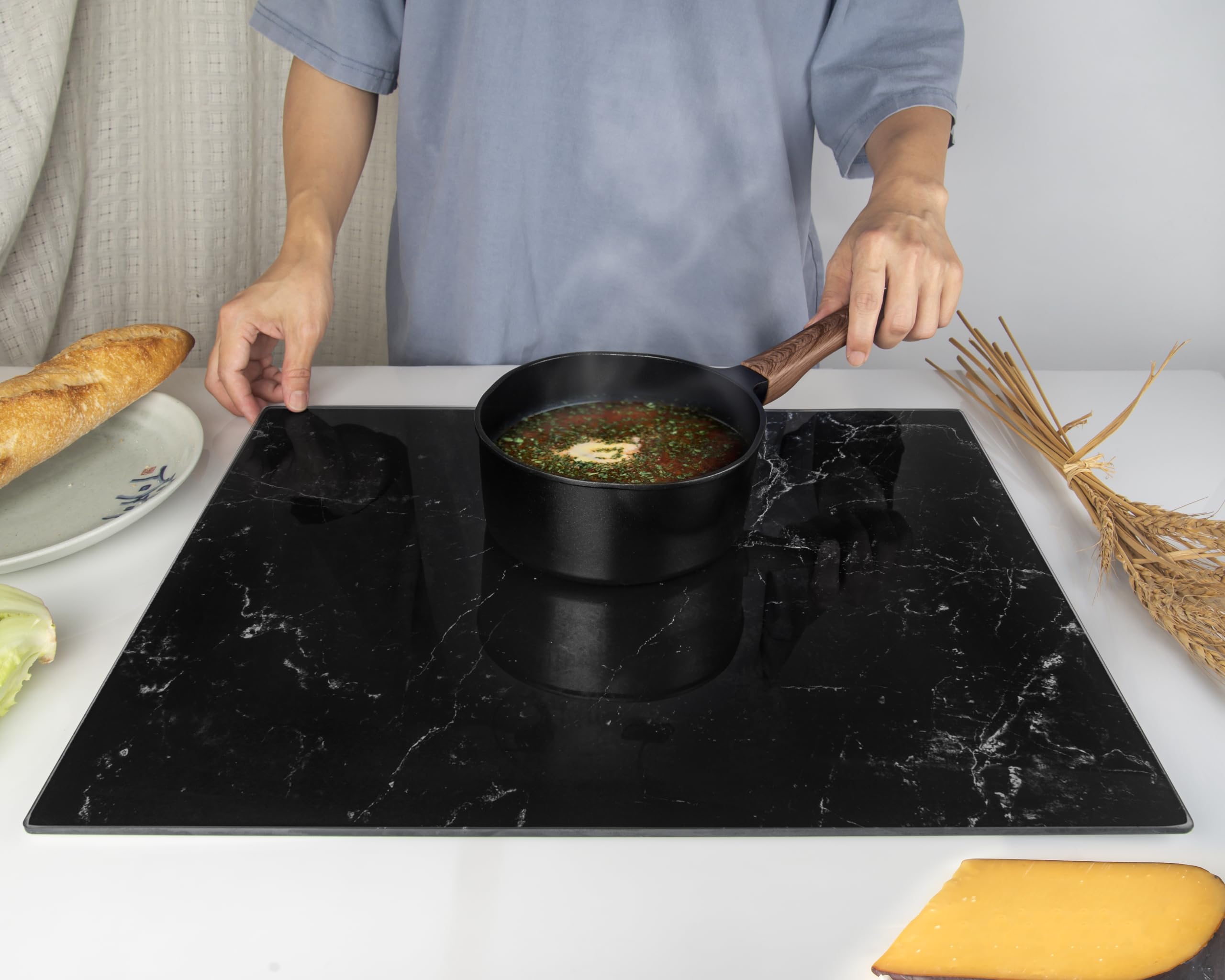 Kitchenville heat-resistant surface doubles as a safe trivet for hot cookware.