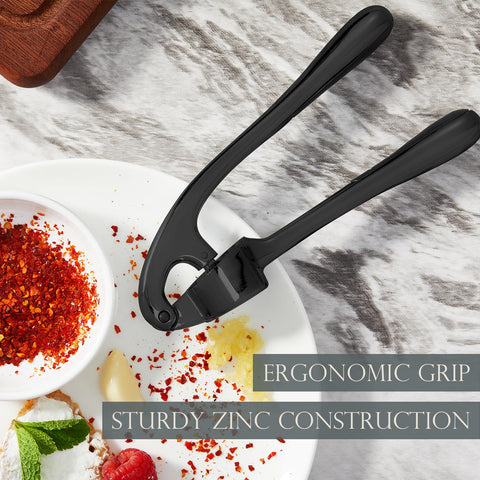 KITESSENSU garlic-press-cleaning-brush demonstrates easy cleanup after meals.