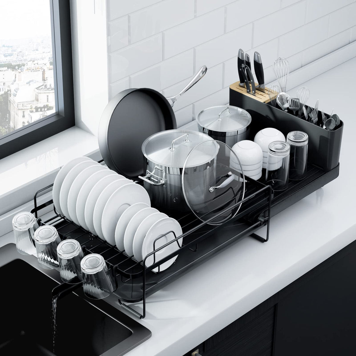 Kitsure extendable dish drying rack extended on a long counter keeps dishes organized.